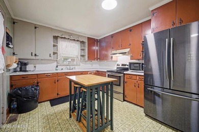 Welcome to this well-built 2-bedroom, 1-bath home located on the - photo 11