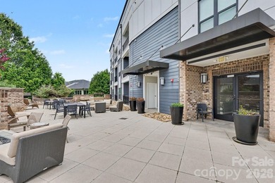 Perched on the top floor of one of NoDa's most coveted addresses - photo 13
