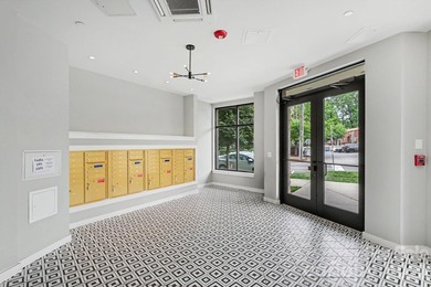 Perched on the top floor of one of NoDa's most coveted addresses - photo 14