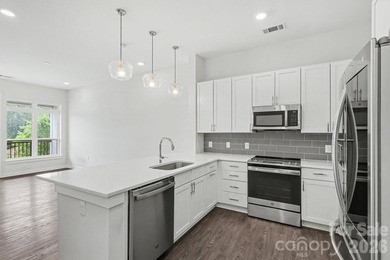 Perched on the top floor of one of NoDa's most coveted addresses - photo 18