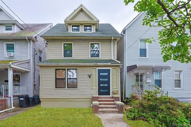 Welcome to this beautiful renovated single-family home in the - photo 1
