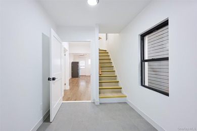 Welcome to this beautiful renovated single-family home in the - photo 3