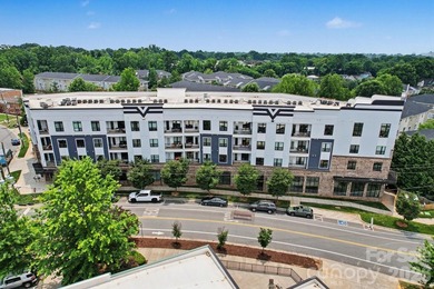 Perched on the top floor of one of NoDa's most coveted addresses - photo 35