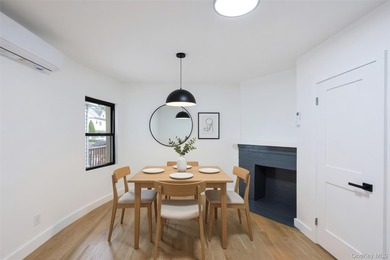 Welcome to this beautiful renovated single-family home in the - photo 5