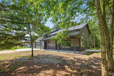 Custom built barndominium in Prairie Sands offering refined - photo 2