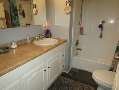 Listed by the Official Sales Team of Jamaica Bay Village. Move - photo 11