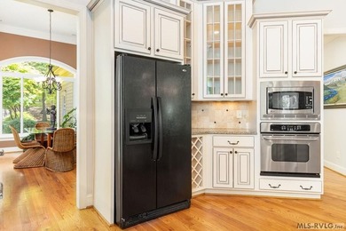 Positioned in a prestigious waterfront neighborhood, this - photo 11