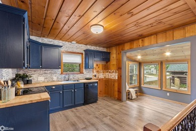 This charming cabin-style home has been completely redone and is - photo 12