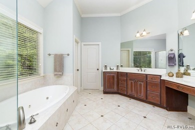Positioned in a prestigious waterfront neighborhood, this - photo 12