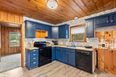 This charming cabin-style home has been completely redone and is - photo 13