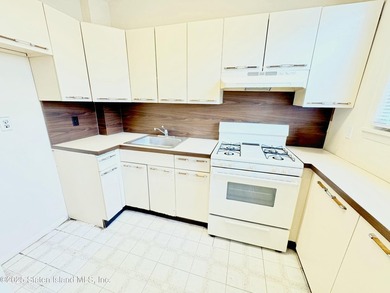 Discover this Large Fabulous Impeccable, 3 Family Home. This - photo 13