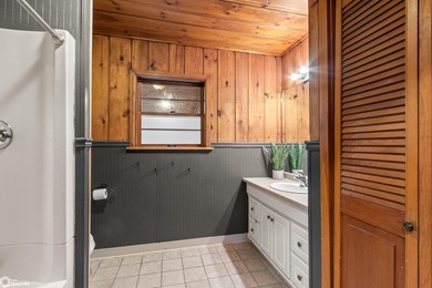 This charming cabin-style home has been completely redone and is - photo 15