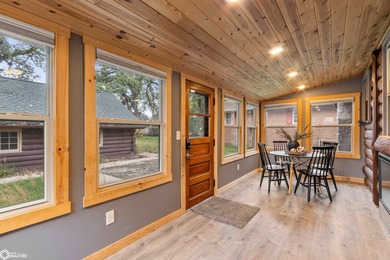 This charming cabin-style home has been completely redone and is - photo 16