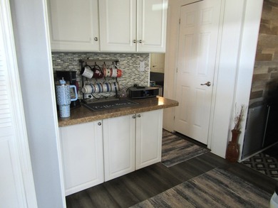 Listed by the Official Sales Team of Jamaica Bay Village. Move - photo 16