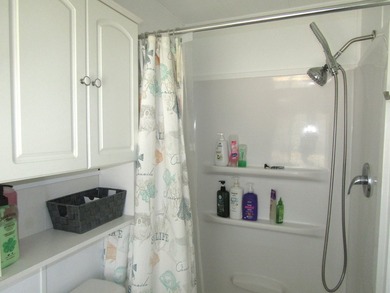 Listed by the Official Sales Team of Jamaica Bay Village. Move - photo 18