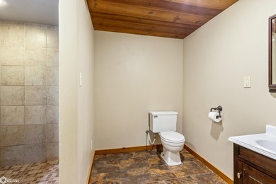 This charming cabin-style home has been completely redone and is - photo 23