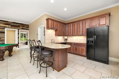 Positioned in a prestigious waterfront neighborhood, this - photo 24