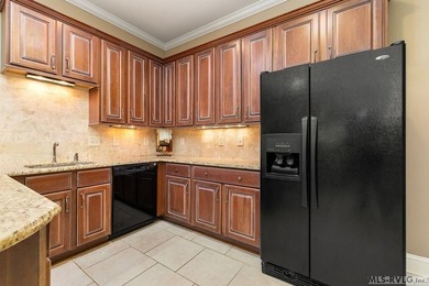 Positioned in a prestigious waterfront neighborhood, this - photo 25