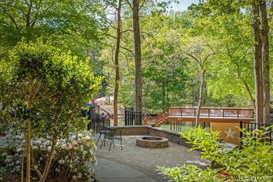 Positioned in a prestigious waterfront neighborhood, this - photo 48