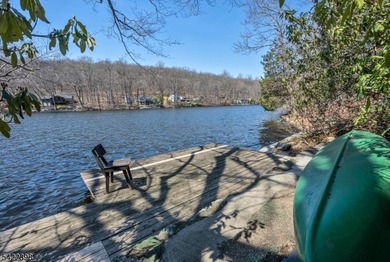 Escape to this idyllic lake front home offering breathtaking - photo 1