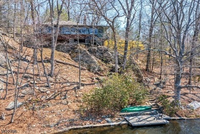 Escape to this idyllic lake front home offering breathtaking - photo 2