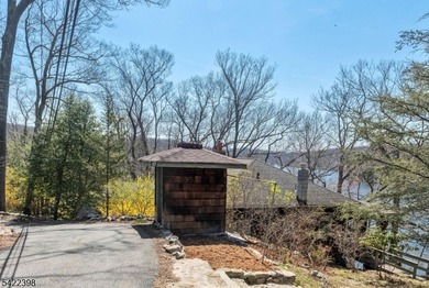 Escape to this idyllic lake front home offering breathtaking - photo 4