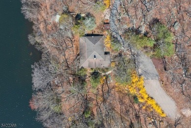 Escape to this idyllic lake front home offering breathtaking - photo 6