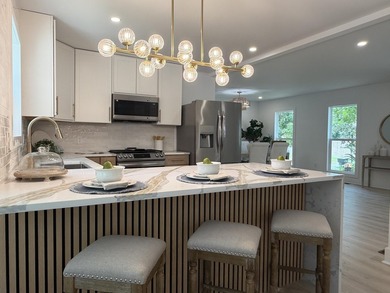 This 2,950-square-foot home has been completely rebuilt through - photo 5