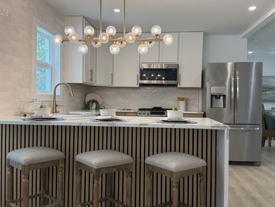 This 2,950-square-foot home has been completely rebuilt through - photo 6