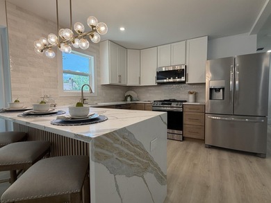This 2,950-square-foot home has been completely rebuilt through - photo 7