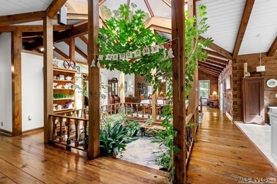 Modern Elegance Meets Views of Fairway #5! Discover a rare - photo 12