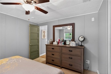 Tucked away on 9.98 secluded acres, this 3 bedroom, 1 bath home - photo 12