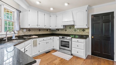 Tucked just minutes from the lake, this spacious home offers - photo 16