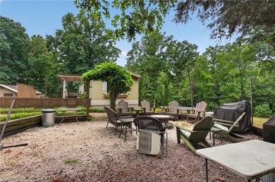 Tucked away on 9.98 secluded acres, this 3 bedroom, 1 bath home - photo 23