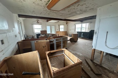 This three-story elevated beach house features 4 bedrooms, 3 - photo 25