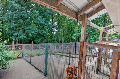 Tucked away on 9.98 secluded acres, this 3 bedroom, 1 bath home - photo 28