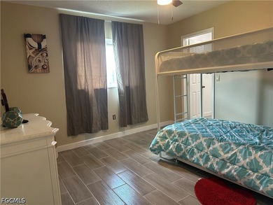 This 3/2 house with open floor plan, heated pool, large back - photo 2