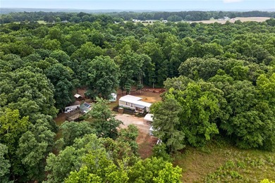 Tucked away on 9.98 secluded acres, this 3 bedroom, 1 bath home - photo 35