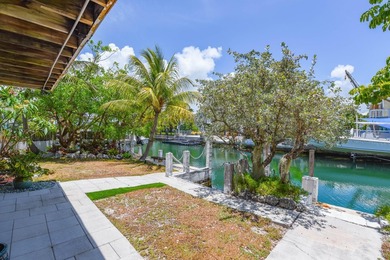 Just minutes from Key West, this open floor plan waterfront home - photo 8