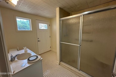 This three-story elevated beach house features 4 bedrooms, 3 - photo 41