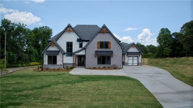 Lake Home For Sale in Cumming, Georgia