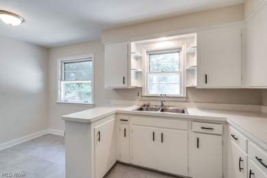 Come see this updated 3-bedroom, 1-bath home in Euclid! Recent - photo 4