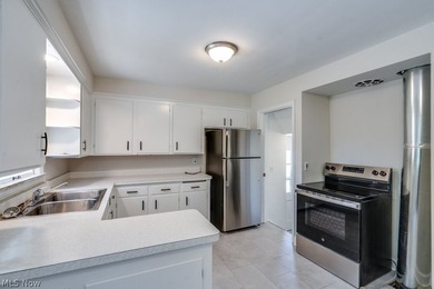 Come see this updated 3-bedroom, 1-bath home in Euclid! Recent - photo 6
