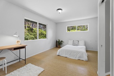 Nestled among lush hapuu ferns, majestic Ohia Lehua trees, and - photo 12