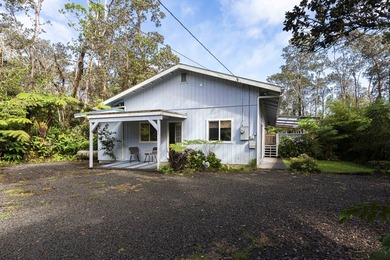 Nestled among lush hapuu ferns, majestic Ohia Lehua trees, and - photo 25
