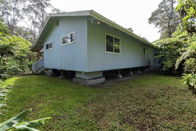 Nestled among lush hapuu ferns, majestic Ohia Lehua trees, and - photo 26