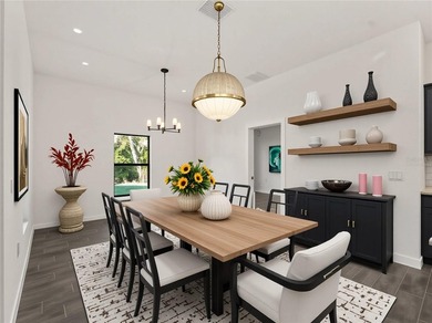 Virtually Staged. Tile throughout. Quartz countertops. Impact - photo 4