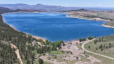 Escape to the tranquility of Carter Lake living. This property - photo 42
