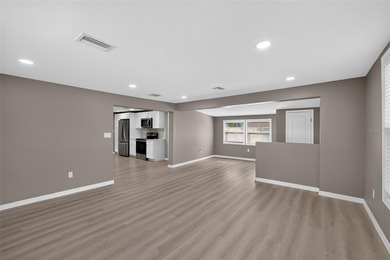 This well-maintained 3-bedroom, 2-bath St. Petersburg home is - photo 5