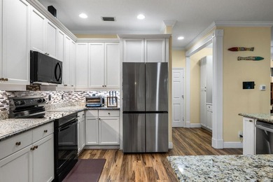 This two-story home is perfectly situated in a charming coastal - photo 16